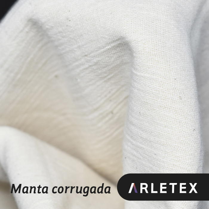 Acercamiento a la textura corrugada de la manta 100% algodón